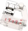 A close-up studio shot of a sewing machine presser foot attachment. Produktbild-Vorschau