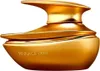 A golden perfume bottle with a unique, sculptural design. Voir les images du produit
