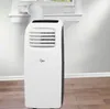 A portable air conditioner unit is shown in a room, connected to a window. Produktbild-Vorschau