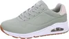 A side view of a single green Skechers sneaker. Produktbild-Vorschau