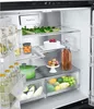 Inside view of an open refrigerator with various food items and a cake. Produktbild-Vorschau