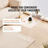 A clear acrylic C-shaped coffee table is shown in a living room setting, next to a sofa. Text overlays highlight features like 'Spacious Storage Panel' and 'Space-saving'. Náhľad obrázku produktu