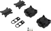 A collection of black plastic parts, likely for a pump repair kit, laid out on a white background. Voir les images du produit