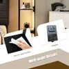 Close-up of a product detail, showing a hand cleaning a surface and a power adapter. Produktbild-Vorschau