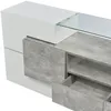 A close-up view of a modern TV stand with a marble-effect finish and white drawers, featuring a glass top. Anteprima dell’immagine prodotto