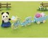 A Sylvanian Families panda figure with a bicycle and trailer on a grassy lawn. Anteprima dell’immagine prodotto