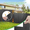 A fence is shown in a backyard setting, with a house in the background. A close-up inset shows how the fence panels connect, and a hand is shown assembling more fence panels. Produktbild-Vorschau
