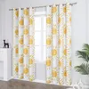 Two yellow sun-patterned curtains hang on a window. Produktbild-Vorschau