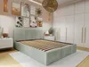 A bedroom with a bed, nightstands, and artwork on the wall. Produktbild-Vorschau