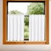 A window with white curtains and a view of trees outside. Produktbild-Vorschau