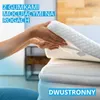 Hands placing a mattress topper on a mattress. Podgląd zdjęcia produktu