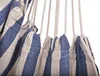 Close-up of a striped hammock chair made of fabric and ropes. Produktbild-Vorschau