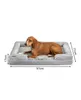 A dog lying on a dog bed with dimensions indicated. Náhled obrázku produktu