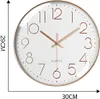A round wall clock with rose gold numbers and hands on a white face, with size indicators on the left and bottom. Produktbild-Vorschau