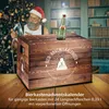 A Christmas-themed scene with a man in a Santa hat holding an iron, and a beer advent calendar in the foreground. Produktbild-Vorschau