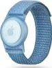 A blue fabric armband with a light blue plastic holder for an Apple AirTag. Náhľad obrázku produktu