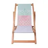A front view of a wooden beach chair with a pineapple pattern on the fabric. Podgląd zdjęcia produktu