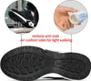 Close-up views of a safety shoe, demonstrating its features and sole. Produktbild-Vorschau