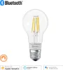 A clear studio shot of a smart LED filament light bulb against a white background, with various compatibility logos at the bottom. Produktbild-Vorschau