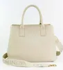 A cream-colored Valentino handbag with a logo-printed strap is shown against a white background. Produktbild-Vorschau