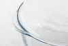 Close-up of the rim and handle of a clear glass baking dish. Náhľad obrázku produktu
