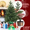 A Christmas tree with gifts and marketing text highlighting its features. Produktbild-Vorschau