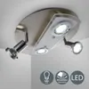 A modern ceiling light fixture with three adjustable LED spotlights, mounted on a brushed metal base with a clear acrylic accent. Náhled obrázku produktu