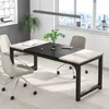 A modern office or conference room setting with a desk and chairs. Anteprima dell’immagine prodotto