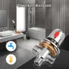A bathroom scene with a shower water mixing valve in the foreground. Náhled obrázku produktu