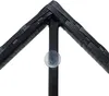 A close-up view of the corner of a black polyrattan table, showing the woven texture and a black support leg with a clear suction cup. Produktbild-Vorschau