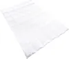 A white quilted comforter is laid out on a white background. Produktbild-Vorschau