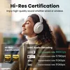 A woman wearing white headphones, with text overlays detailing audio certifications and transmission rates. Voir les images du produit