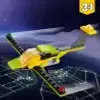 A toy airplane flying over a digital grid representing a city at night. Anteprima dell’immagine prodotto