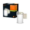 A product shot of an outdoor wall light and its packaging. Produktbild-Vorschau