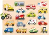 A wooden puzzle board with various vehicle shapes. Produktbild-Vorschau
