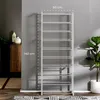 A tall, multi-tiered shoe rack stands against a gray wall, with measurements indicated by dashed lines and text. Produktbild-Vorschau