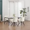 A dining room setting with a table and chairs. Náhľad obrázku produktu