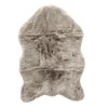 A faux fur rug on a white background. Produktbild-Vorschau