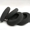 Several black foam headphone ear pads are arranged on a white background. Produktbild-Vorschau
