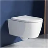 A white wall-mounted toilet against a blue wall. Produktbild-Vorschau