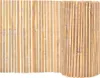 A close-up view of a rolled-up bamboo fence and a section of an unrolled fence against a white background. Podgląd zdjęcia produktu