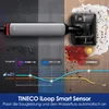 A vacuum cleaner head is shown cleaning up a spill on a wooden floor, with graphics illustrating its smart sensor technology. Produktbild-Vorschau