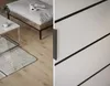 A split image showing a modern living room on the left and a close-up of a door handle and decorative stripes on the right. Produktbild-Vorschau