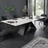 A dining room scene with a modern marble-top dining table and chairs. Produktbild-Vorschau