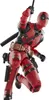 A full-body shot of a Deadpool action figure in a dynamic pose against a white background. Náhled obrázku produktu