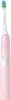 A pink electric toothbrush with a green brush head is shown against a white background. Voir les images du produit