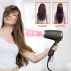 A woman is using a hairdryer on her hair, with before and after images of hair shown. Anteprima dell’immagine prodotto