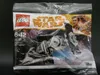 A sealed plastic bag containing a Lego Star Wars Imperial Tie Fighter set. Produktbild-Vorschau