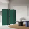 A living room scene with a green folding screen divider, a sofa, and coffee tables. Produktbild-Vorschau