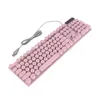 A pink keyboard with round keys and a USB cable is shown against a white background. Náhled obrázku produktu